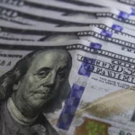 Dólar encerra em queda 0,60%